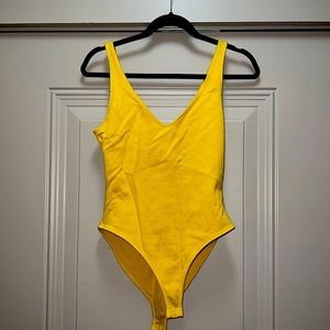 Forever 21 yellow bodysuit.
